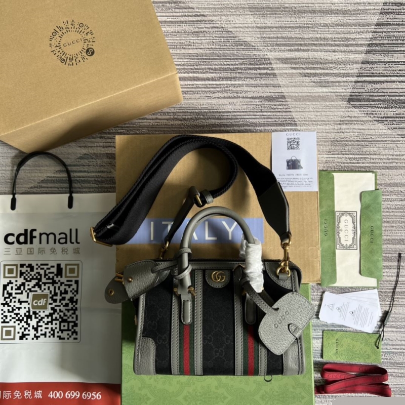 G*u*i top handle bags